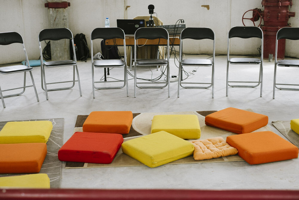 Chairs and colourful cushions
